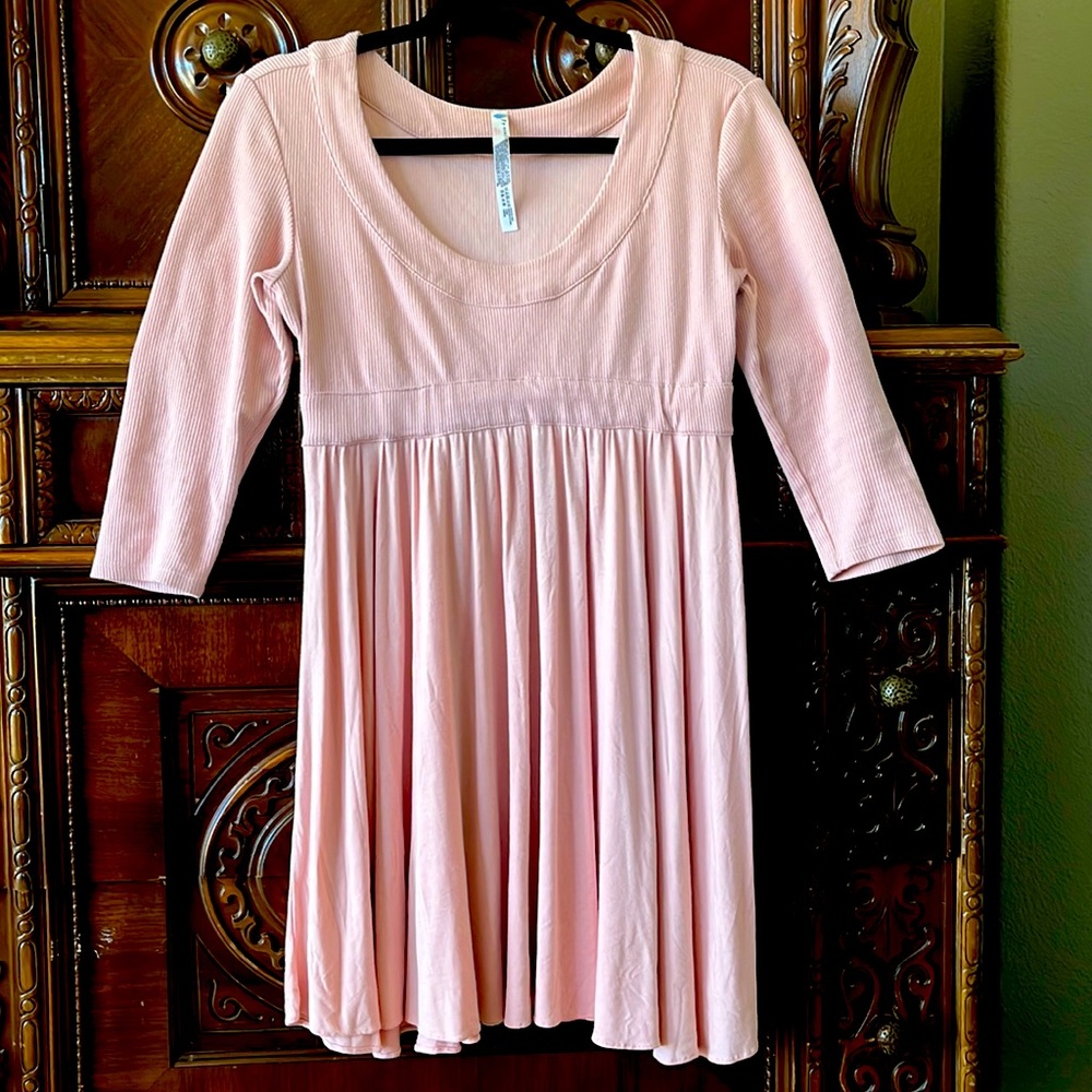 Free People Movement baby doll pink dress.